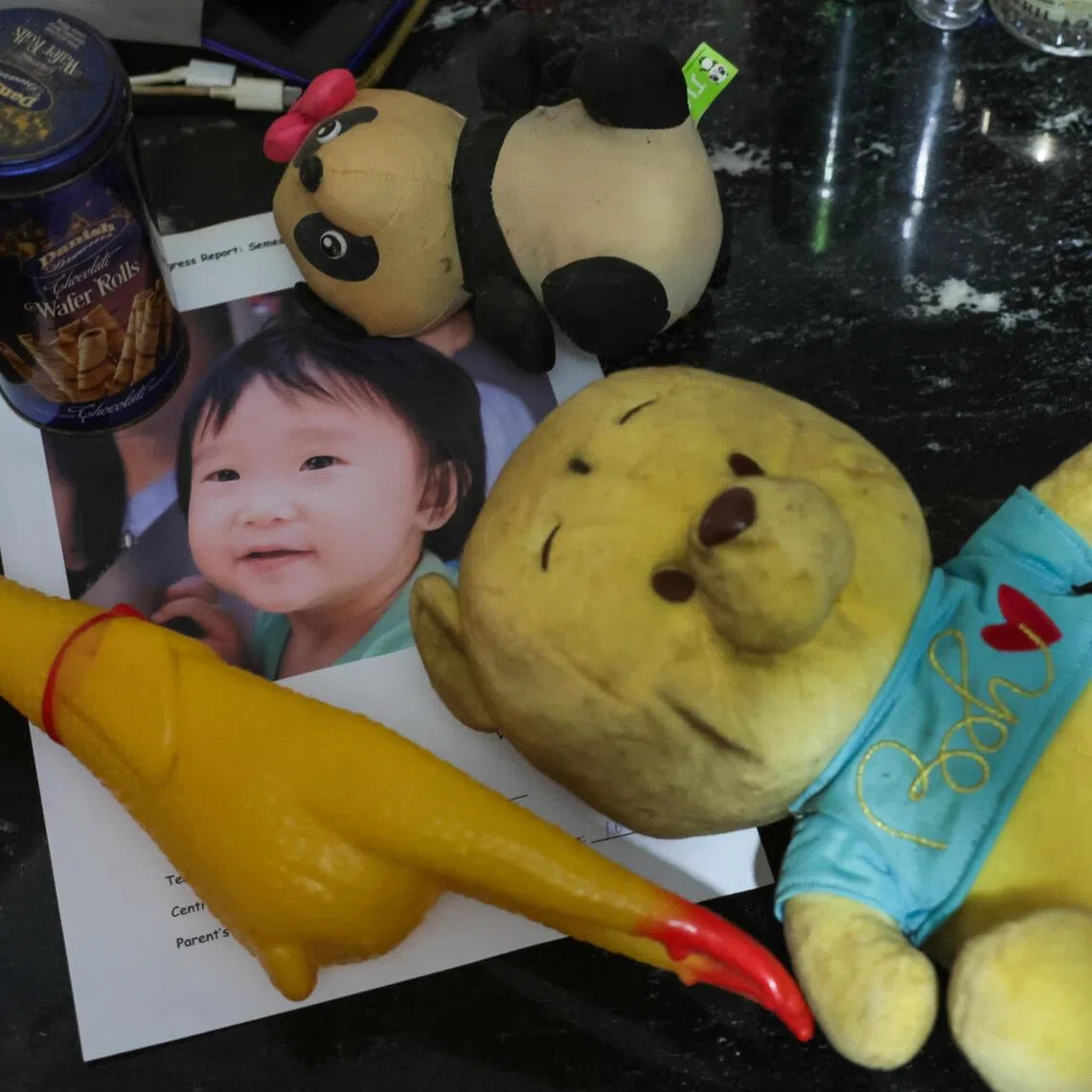 ST USE ONLY.
ST20251024_202596400303: Gin Tay/ chgranny24/ 
A selection of toys and photo of Megan Khung taken in 2017, photographed at her grandmother's flat on Oct 24, 2025