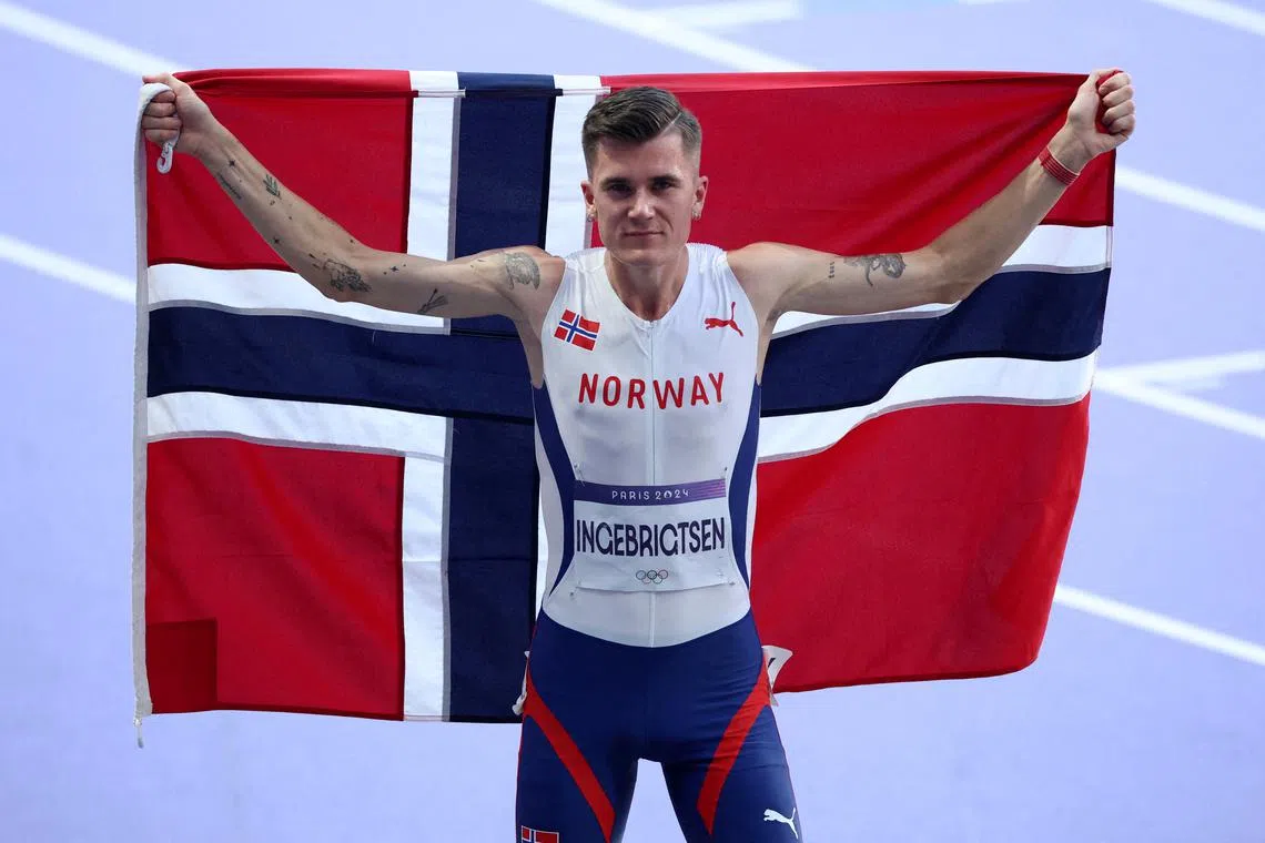 FILE PHOTO: Paris 2024 Olympics - Athletics - Men's 5000m Final - Stade de France, Saint-Denis, France - August 10, 2024. Jakob Ingebrigtsen of Norway celebrates after winning gold. REUTERS/Phil Noble/File Photo