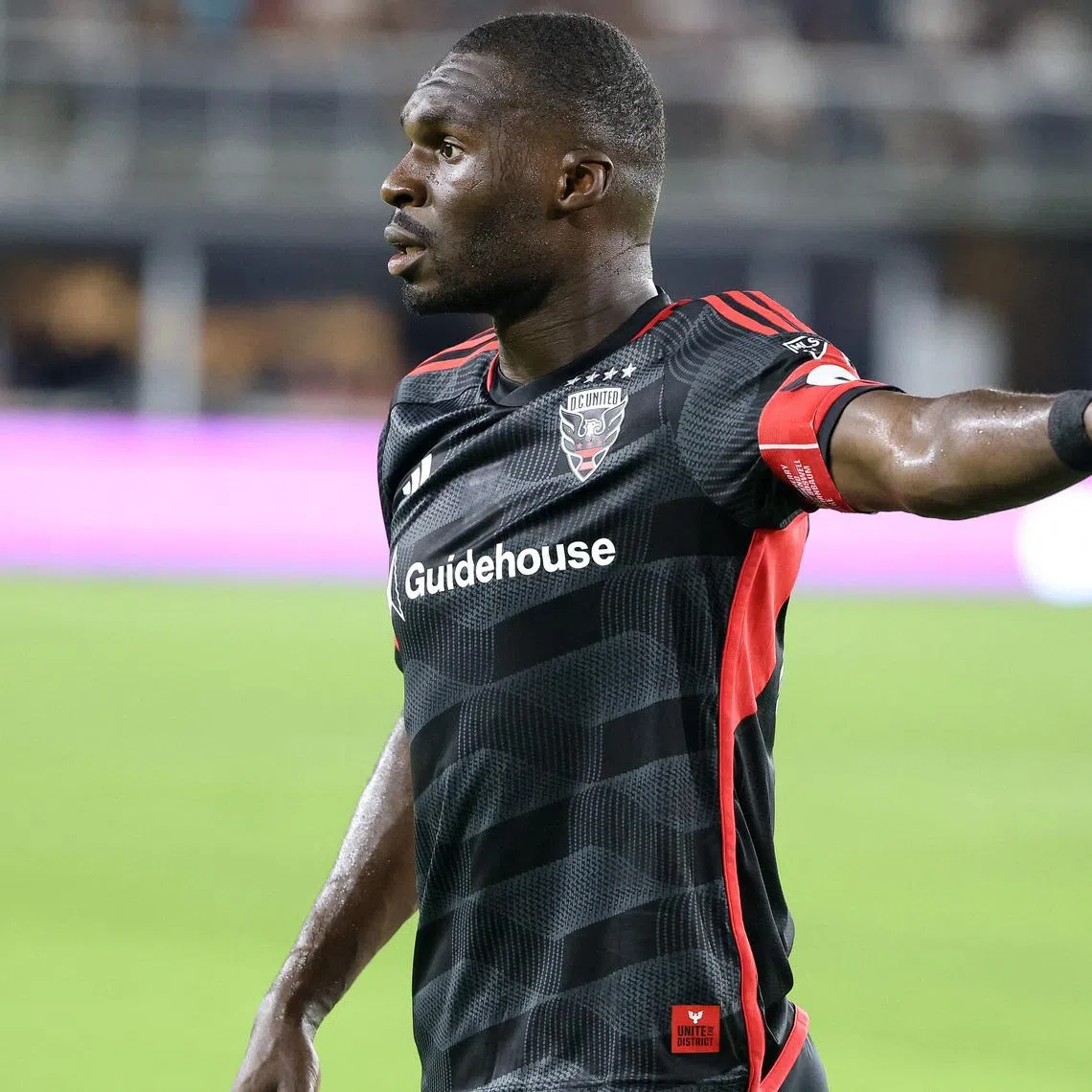 Jun 28, 2025; Washington, District of Columbia, USA; D.C. United forward Christian Benteke (20) looks on during the second half against the Nashville SC at Audi Field. Mandatory Credit: Daniel Kucin Jr.-Imagn Images