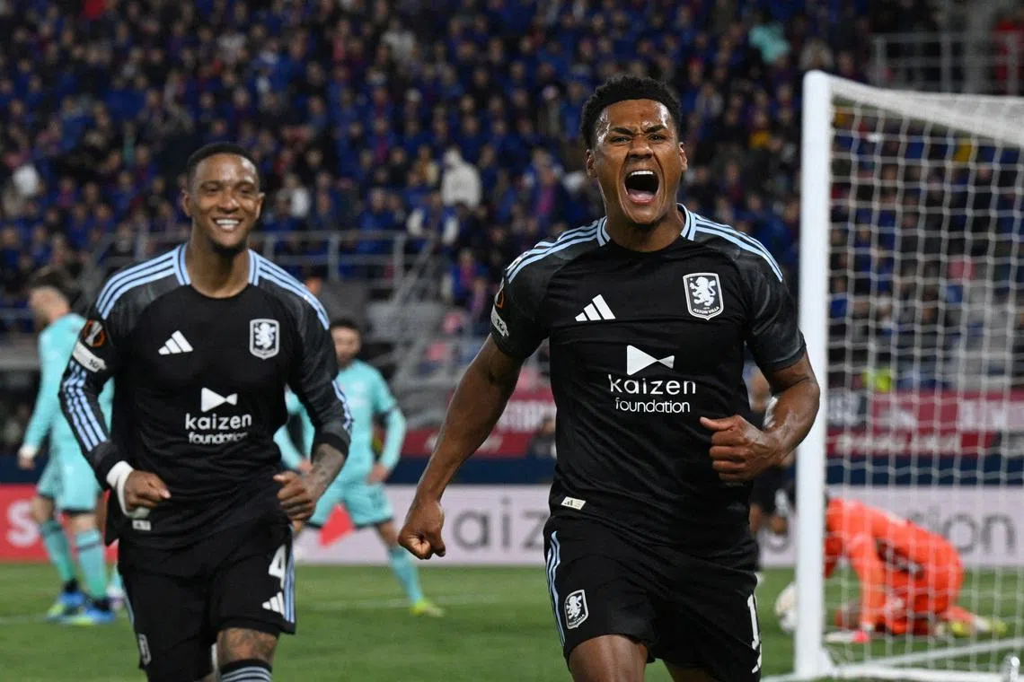 Soccer Football - UEFA Europa League - Quarter Final - First Leg - Bologna v Aston Villa - Stadio Renato Dall'Ara, Bologna, Italy - April 9, 2026 Aston Villa's Ollie Watkins celebrates scoring their third goal REUTERS/Jennifer Lorenzini