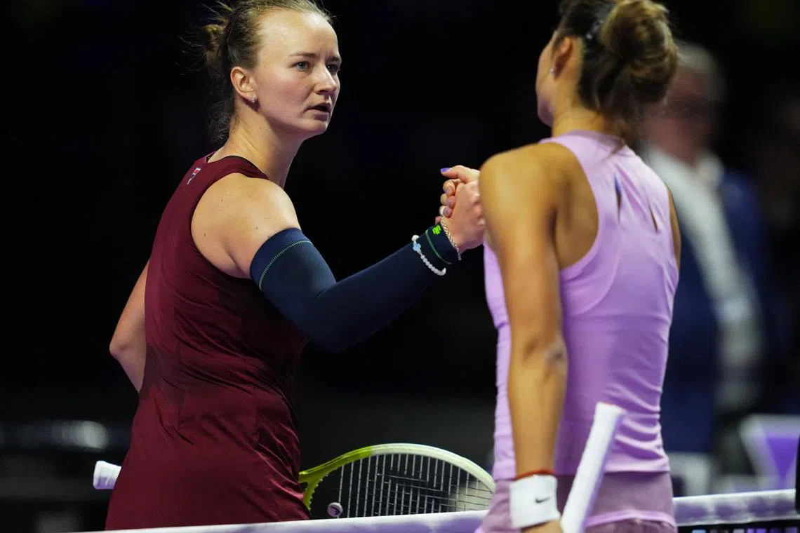 Barbora Krejcikova and Qinwen Zheng. November 8, 2024. REUTERS/Aleksandra Szmigiel