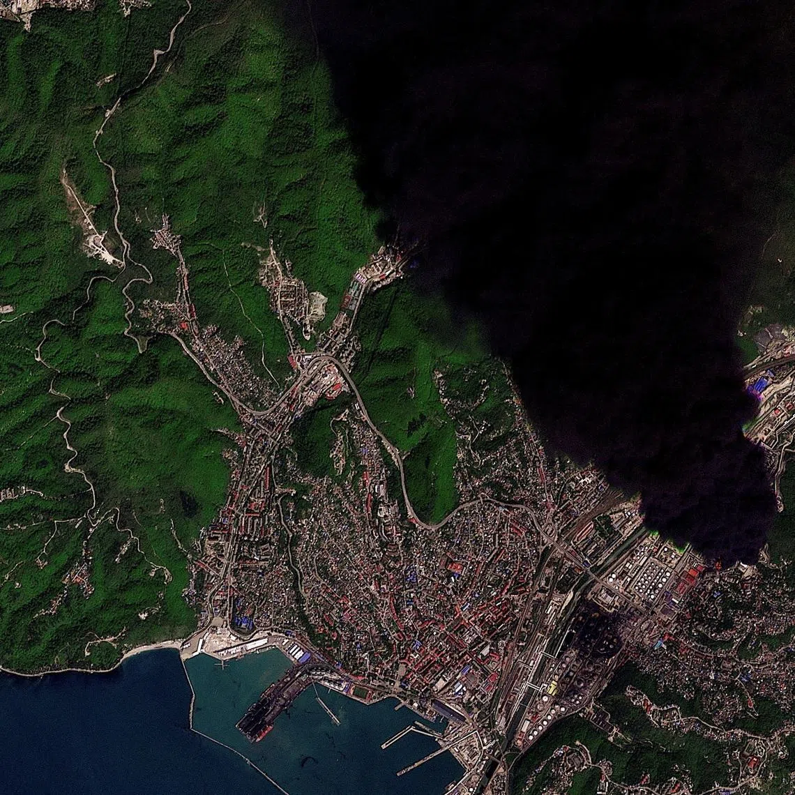 FILE PHOTO: Smoke rises from the site following a Ukrainian drone attack that caused a fire at an oil refinery, amid the Russia-Ukraine conflict, in Tuapse, Krasnodar Krai, Russia, April 28, 2026. 2026 Planet Labs PBC/Handout via REUTERS/File Photo