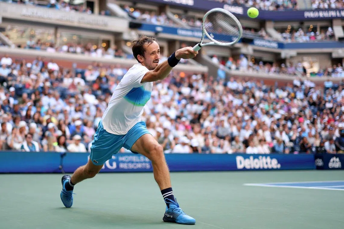 Daniil Medvedev of Russia returns a shot against Nuno Borges of Portugal during their Men's Singles Fourth Round match.