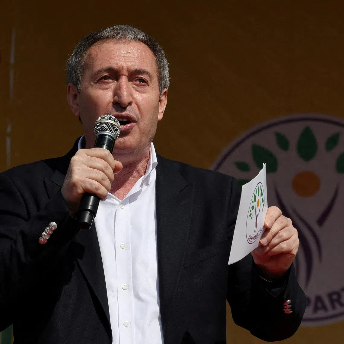 Tuncer Bakirhan, co-chair of pro-Kurdish Peoples' Equality and Democracy Party (DEM Party), speaks during a rally to celebrate Nowruz, which marks the arrival of spring, in Istanbul, Turkey, March 17, 2024. REUTERS/Umit Bektas