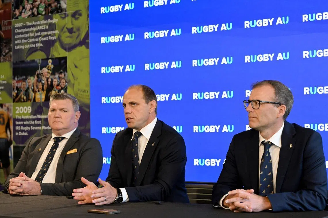 From left: Rugby Australia chair Dan Herbert, chief executive Phil Waugh and chief operating officer Richard Gardham at a press conference in Sydney on April 22, 2026, following the organisation’s annual general meeting.