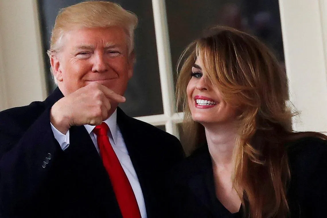 A 2018 photo shows then US president Donald Trump with his White House communications director Hope Hicks.
