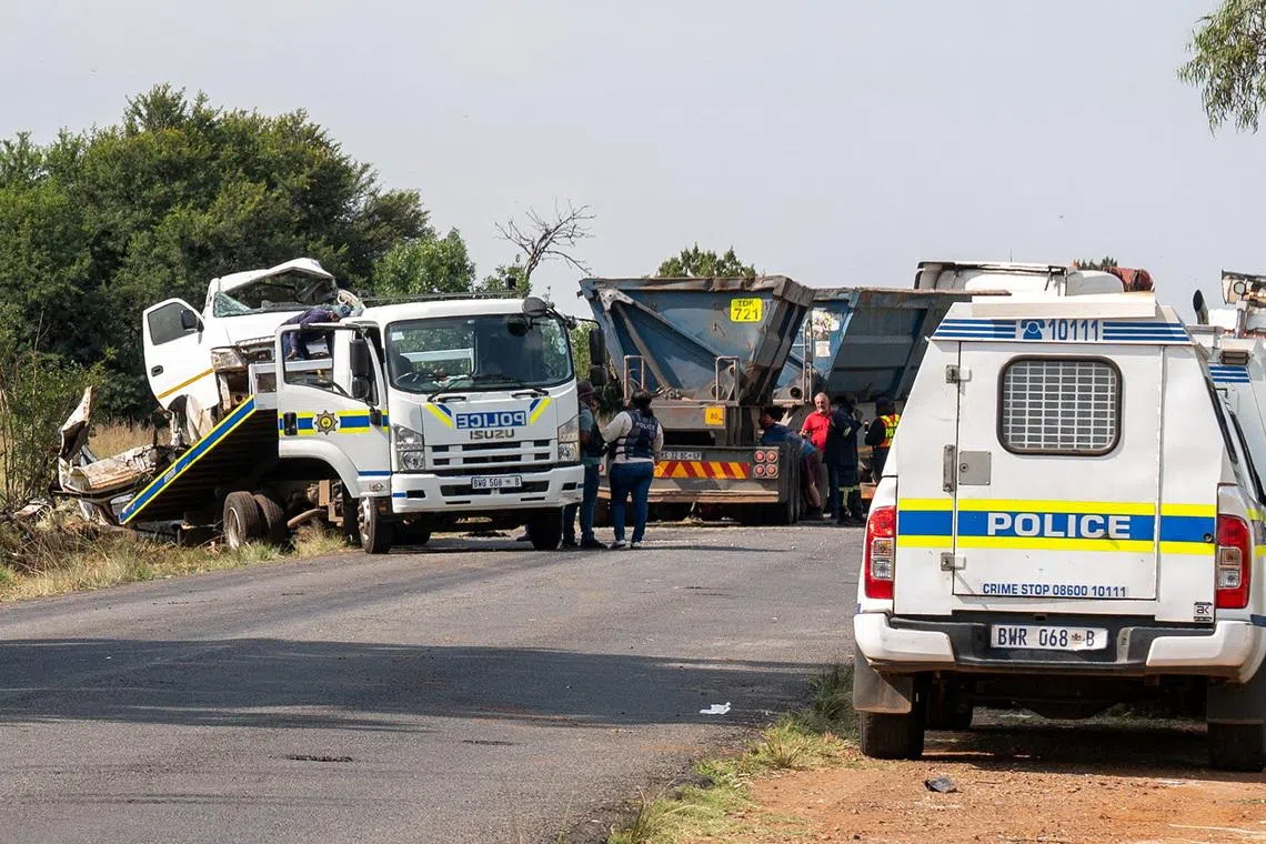 The scene of a fatal crash of 13 schoolchildren who perished ​when their minibus collided with a truck, in Johannesburg, South Africa, January 19, 2026. REUTERS/Shiraaz Mohamed
