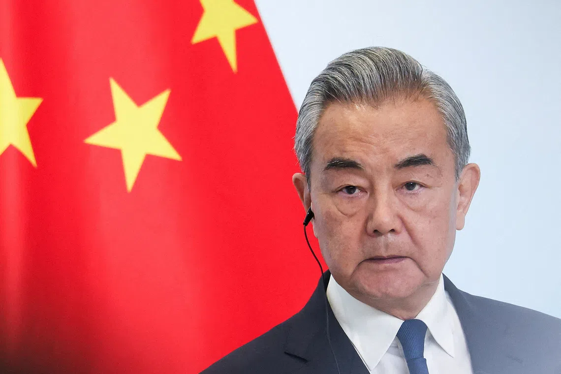 FILE PHOTO: Chinese Foreign Minister Wang Yi attends a press conference at the 2025 Shanghai Cooperation Organisation (SCO) summit in Tianjin, China September 1, 2025. REUTERS/Maxim Shemetov/File Photo