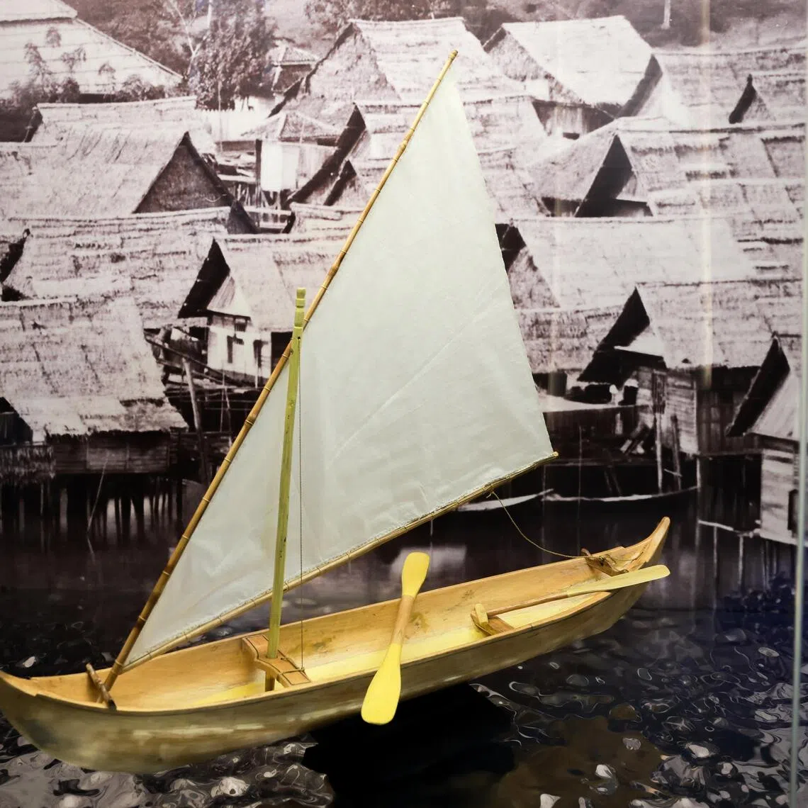 A model of a dugout sailboat is displayed in the revamped Singapore History Gallery at the National Museum of Singapore on Sept 29.