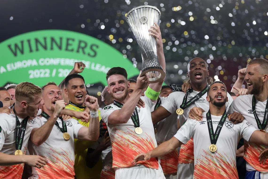 Declan Rice of West Ham celebrates with the trophy after winning the Europa Conference League Final against Fiorentina.