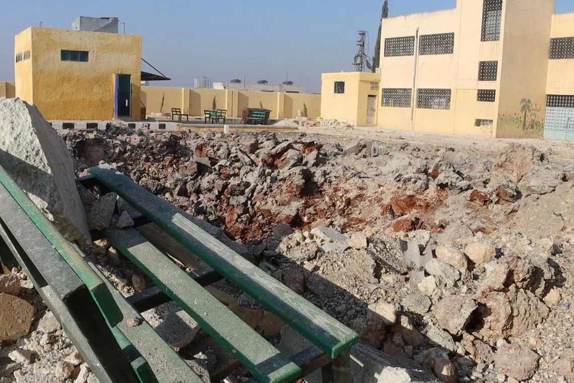 Debris of schools lies in the aftermath of airstrikes in Atarib, Aleppo, Syria November 29, 2024. The White Helmets/Handout via REUTERS/File Photo