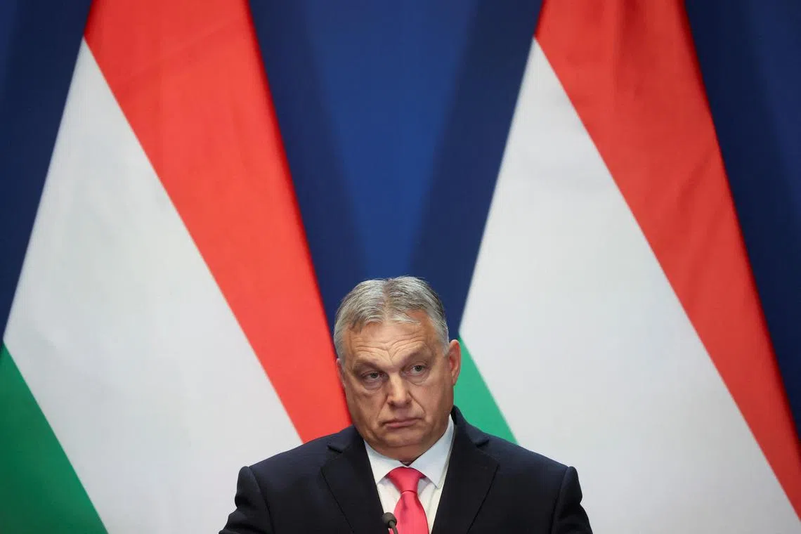 Hungarian Prime Minister Viktor Orban reacts at a joint press conference with Slovak Prime Minister Robert Fico in Budapest, Hungary, January 16, 2024. REUTERS/Bernadett Szabo
