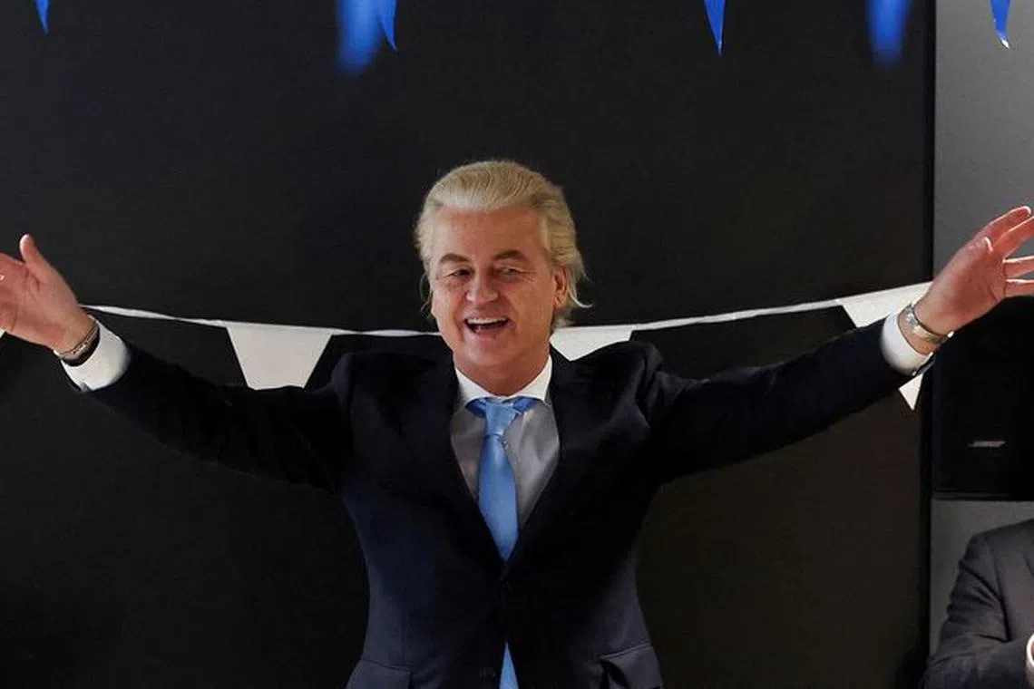 FILE PHOTO: Dutch far-right politician and leader of the PVV party, Geert Wilders gestures as he meets with members of his party at the Dutch Parliament, after the Dutch parliamentary elections, in The Hague, Netherlands November 23, 2023. REUTERS/Yves Herman/File Photo