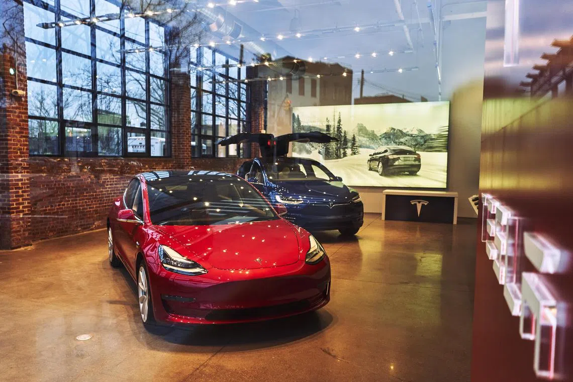 Tesla delivered 405,000 electric cars from October through December. It was a record number but missed Wall Street estimates of around 420,000 vehicles.