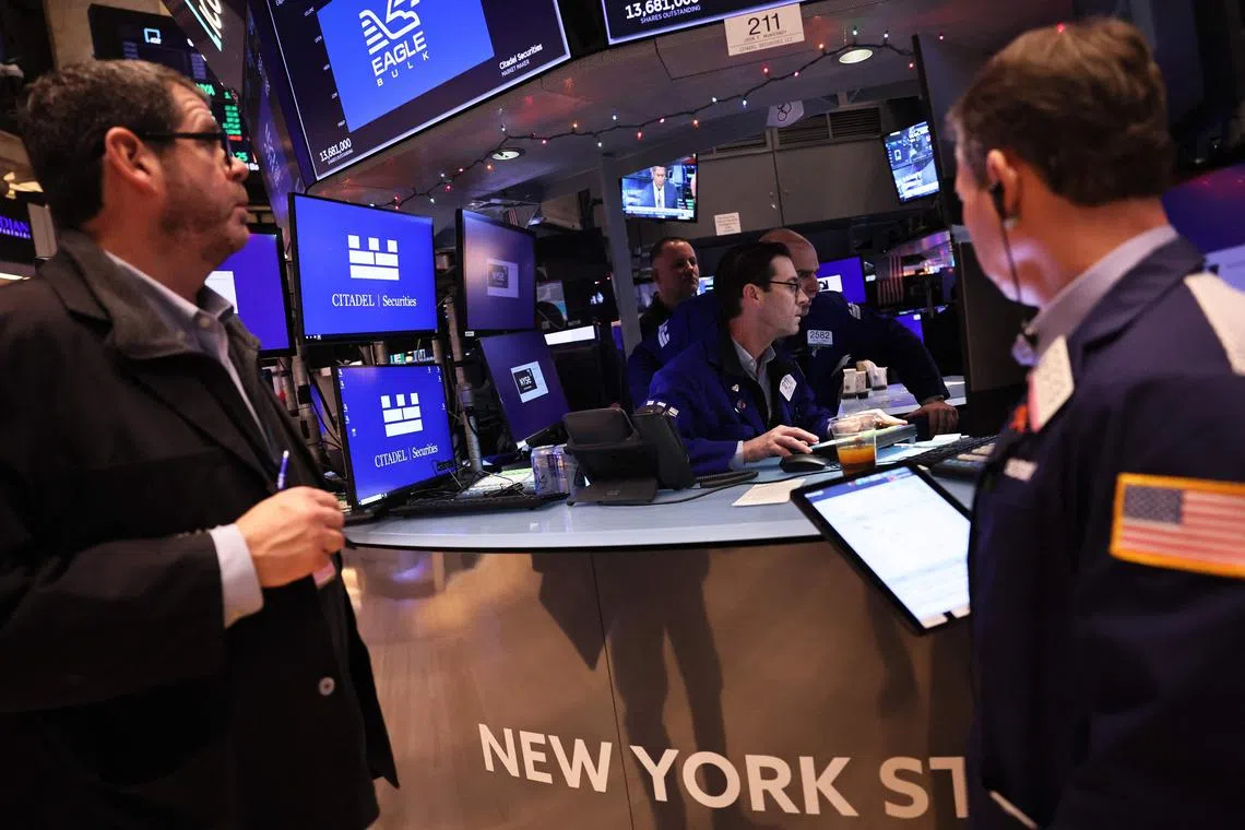 Traders work on the floor of the New York Stock Exchange, during morning trading, on Jan 4, 2023 in New York City.