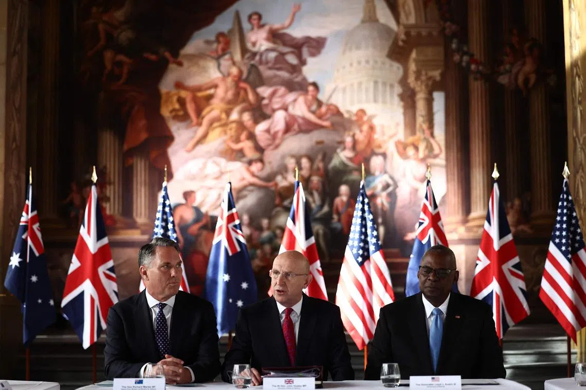 (From left) Australian Defence Minister Richard Marles, British Defence Secretary John Healey and US Defence Secretary Lloyd Austin meeting in London on Sept 26 for talks on the Aukus military alliance. 