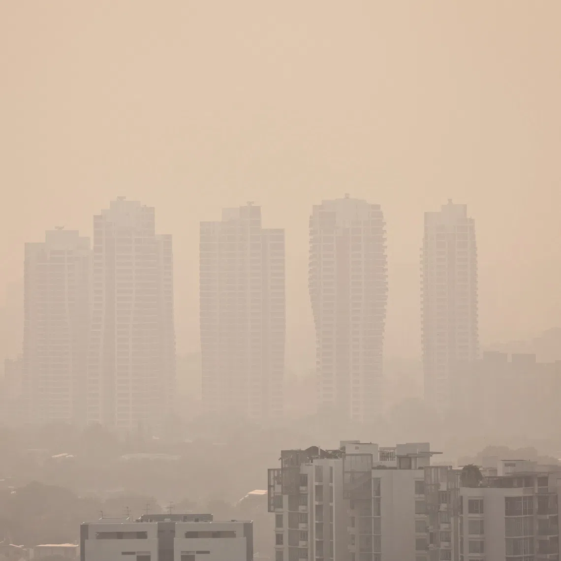 PIXHAZE04 Hazy conditions seen from Clementi in western Singapore, looking towards Holland Village and Bukit Timah, at about 7.50am on Sept 4, 2026. STPHOTO VIDEO KELVIN CHNG