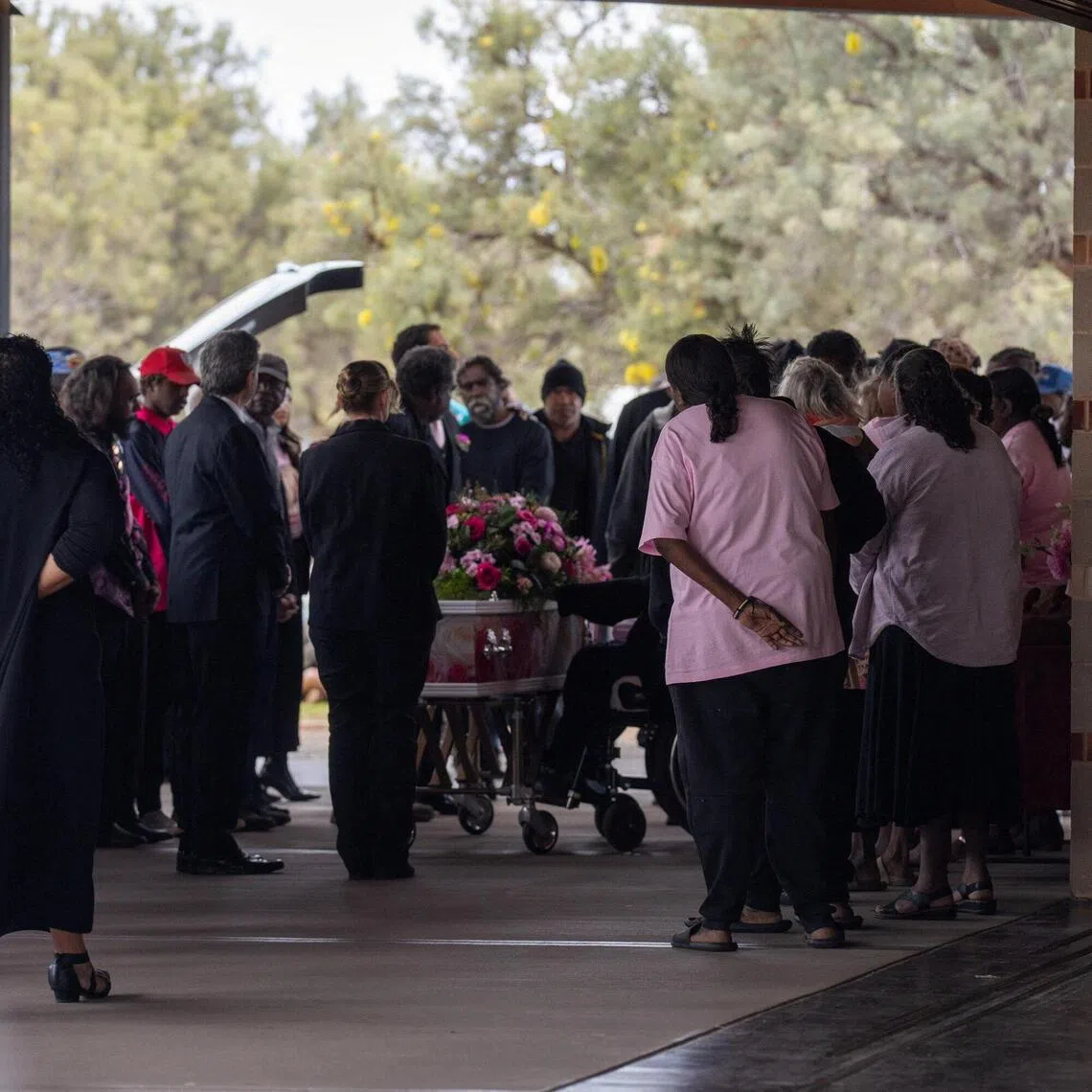 Mourners attend the funeral service for five-year-old Kumanjayi Little Baby at Alice Springs Garden Cemetery in Australia on Aug 15.