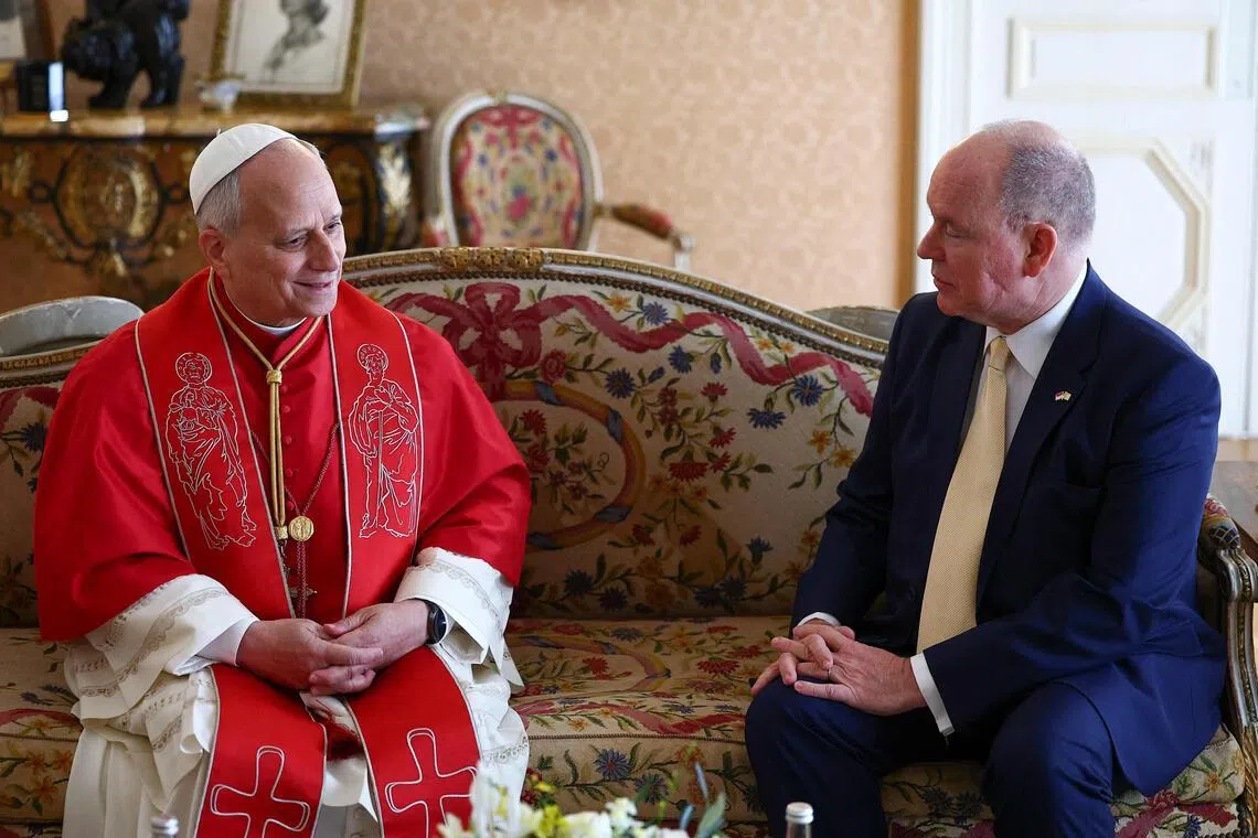 Pope Leo (left) meets with Prince Albert II of Monaco during a private audience in the Prince's Palace of Monaco in Monte Carlo.