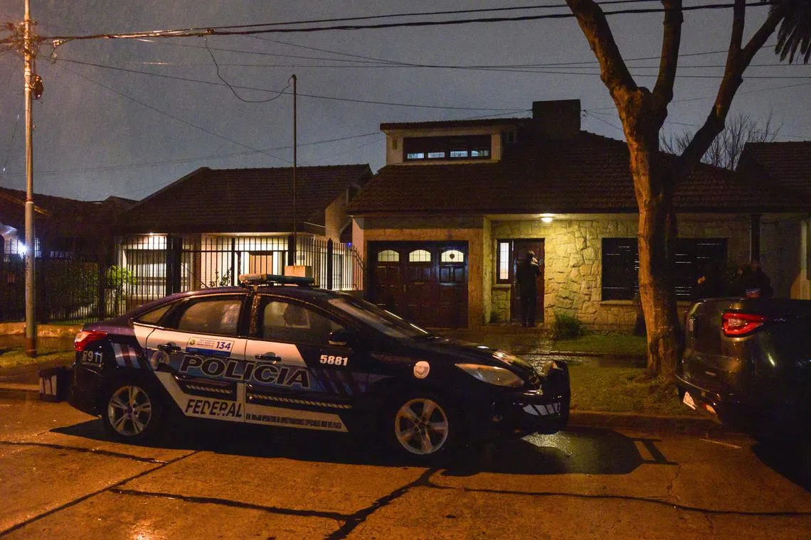 An Argentine Federal Police car is parked outside a house where an Argentine federal court ordered a raid to search for a portrait of Contessa Colleonia, a 17th-century painting by Italian artist Giuseppe Ghislandi, stolen decades ago by the Nazis, after the painting was recently spotted in a real estate listing, in the coastal city of Mar del Plata, Argentina, September 1, 2025. REUTERS/Pilar Subirat