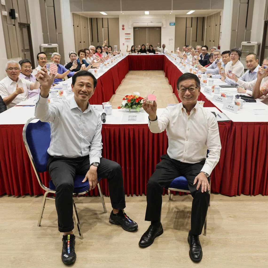 ST20240621_202471000569: Gin Tay/ smong21/ Shermaine Ang/

Mr Ong Ye Kung, (centre -left) Chairman of the CDAC Board of Directors and Minister for Health; and Mr Roland Ng, (centre right) CDAC Board of Trustees Chairman; together with CDAC Board of Directors and Board of Trustees; holding the Lego flower in a group photo during the 32nd Annual General Meeting (AGM) at CDAC Headquarters Auditorium, on June 21, 2024.