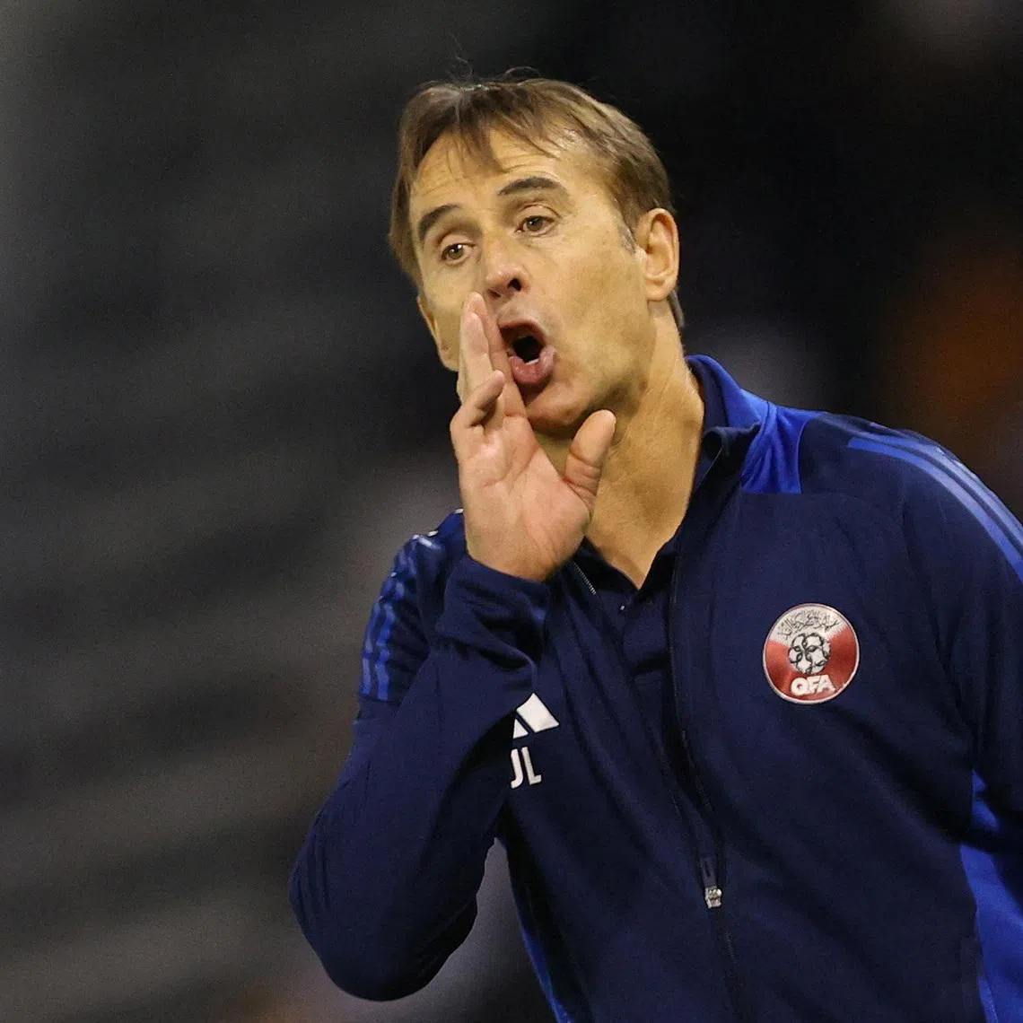 FILE PHOTO: Soccer Football - World Cup - AFC Qualifiers - Group A - Qatar v Iran - Jassim Bin Hamad Stadium, Doha, Qatar - June 5, 2025 Qatar coach Julen Lopetegui reacts during the match REUTERS/Ibraheem Al Omari/File Photo