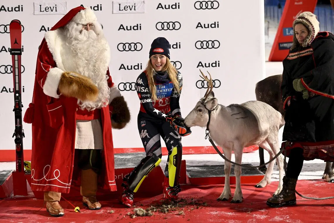 Alpine Skiing - FIS Alpine Ski World Cup - Women's Slalom - Levi Ski Centre, Kittila, Finland - November 15, 2025
Mikaela Shiffrin of the U.S. feeds the reindeer of Santa Claus on the podium after winning the women's slalom
RONI REKOMAA/Lehtikuva via REUTERS

ATTENTION EDITORS - THIS IMAGE WAS PROVIDED BY A THIRD PARTY. NO THIRD PARTY SALES. NOT FOR USE BY REUTERS THIRD PARTY DISTRIBUTORS. FINLAND OUT. NO COMMERCIAL OR EDITORIAL SALES IN FINLAND.