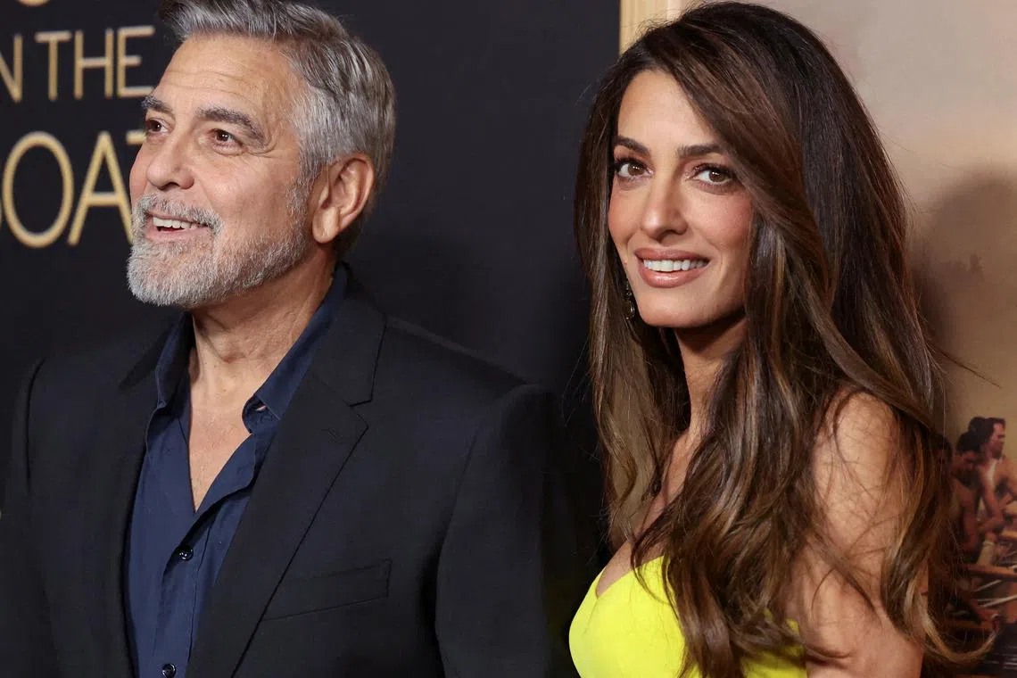 FILE PHOTO: Director George Clooney and his wife lawyer Amal Clooney attend a premiere for the film 'The Boys in the Boat' in Beverly Hills, California, U.S., December 11, 2023. REUTERS/Mario Anzuoni/File Photo