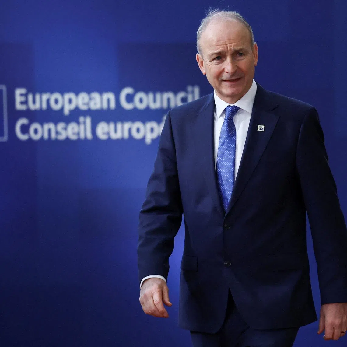 Ireland Prime Minister Micheal Martin arrives at a European Union leaders' summit in Brussels, Belgium, December 18, 2025. REUTERS/Yves Herman