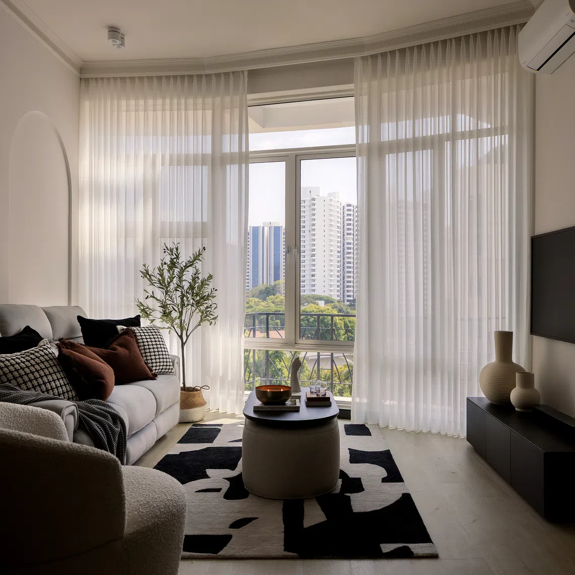 As the owners of this Tanglin three-bedder love to entertain guests, a sunny, spacious living area was essential.