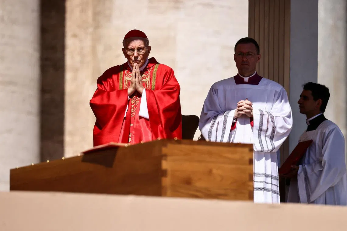 Cardinal Giovanni Battista Re leads the funeral Mass of Pope Francis in St. Peter's Square at the Vatican, April 26, 2025. REUTERS/Yara Nardi