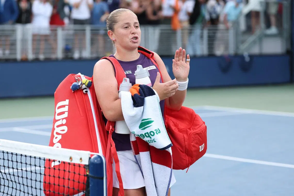 Jelena Ostapenko of Latvia walks off the court after losing to Taylor Townsend of the United States during their second round match.