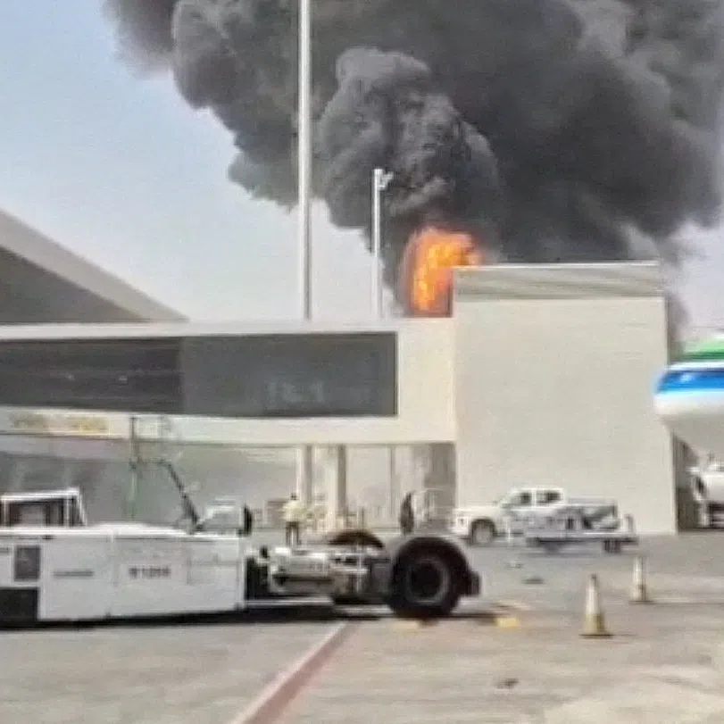 FILE PHOTO: Smoke and flames rise from King Khalid Airport, after Yemen's Iran-backed Houthis said they attacked the airport, in Riyadh, Saudi Arabia, October 8, 2026, in this screengrab obtained from a social media video. Social Media/via REUTERS
