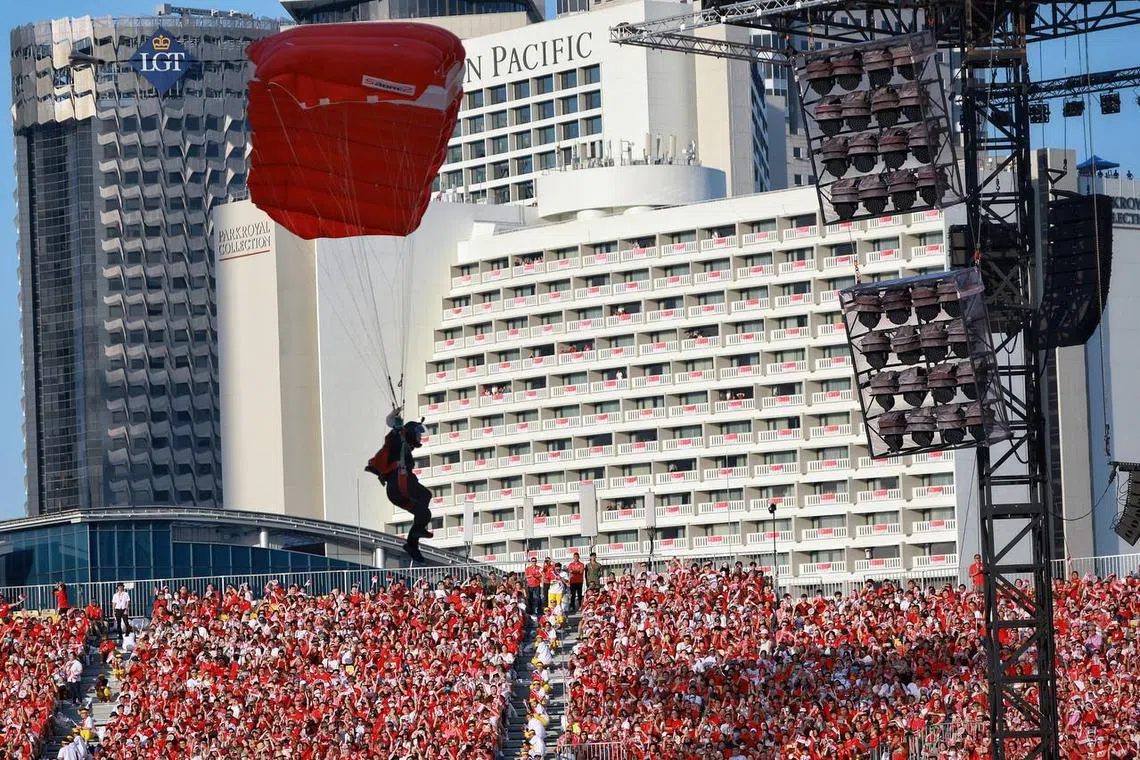 A Red Lion making his descent during the National Day Parade at the Padang on Aug 9.