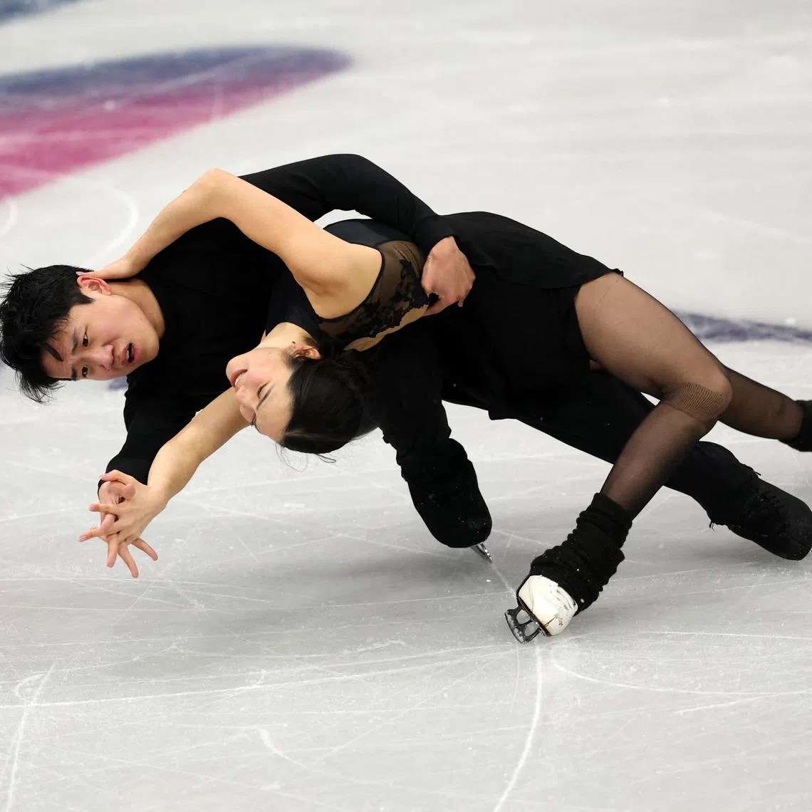 Milano Cortina 2026 Winter Olympics - Figure Skating - Milano Ice Skating Arena, Milan, Italy - February 2, 2026 Hannah Lim and Ye Quan of South Korea during practice REUTERS/Amanda Perobelli