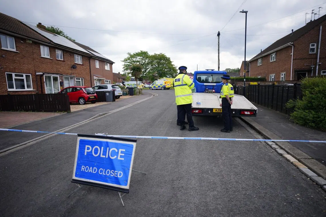 Emergency services at the scene, where two adults have died after an explosion at a house in Sterncourt Road, Bristol, on May 3.