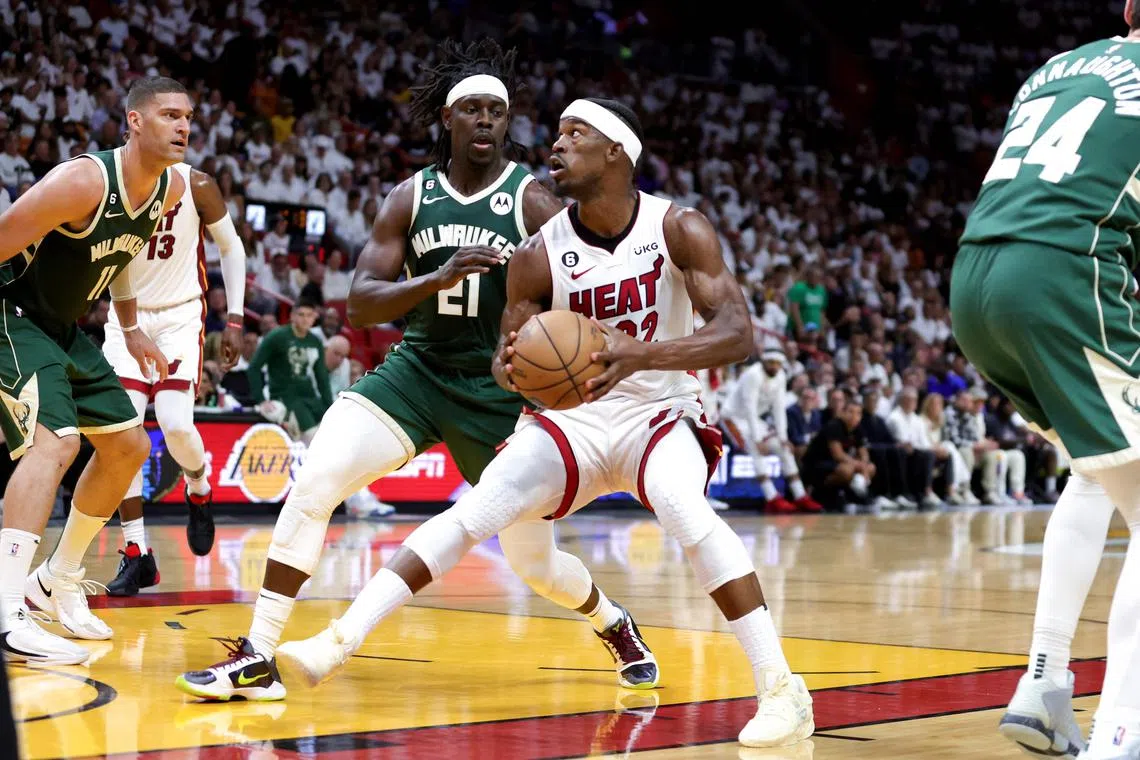 Miami's Jimmy Butler gets ready to take a shot as the Milwaukee's Jrue Holiday defends in Game 3 of the NBA Eastern Conference first-round play-offs in  Florida on April 22, 2023. The Heat won 121-99.