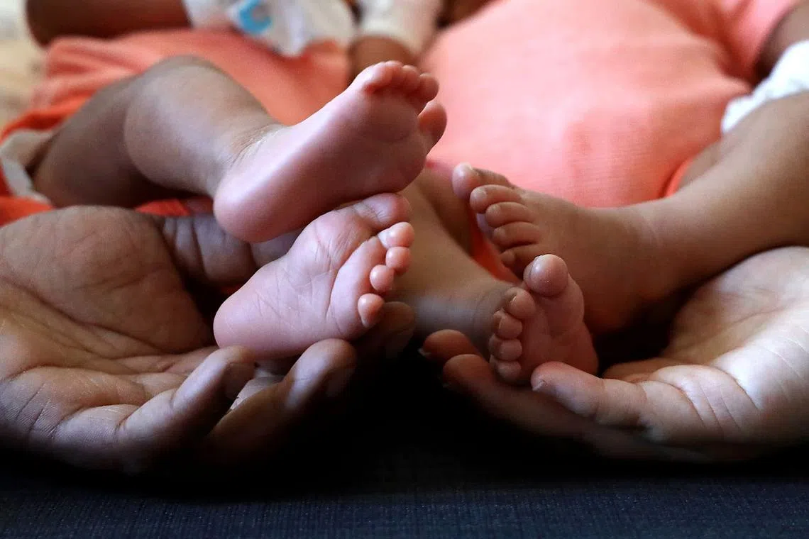 The writer's newborn twins in 2020. While pregnant, she was asked what colour her babies would be.