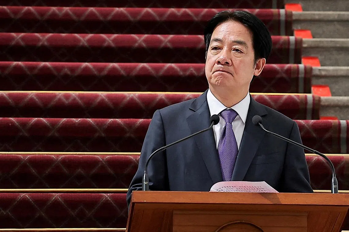 FILE PHOTO: Taiwan's President Lai Ching-te holds a press conference in Taipei, Taiwan February 14, 2025. REUTERS/Ann Wang/File Photo