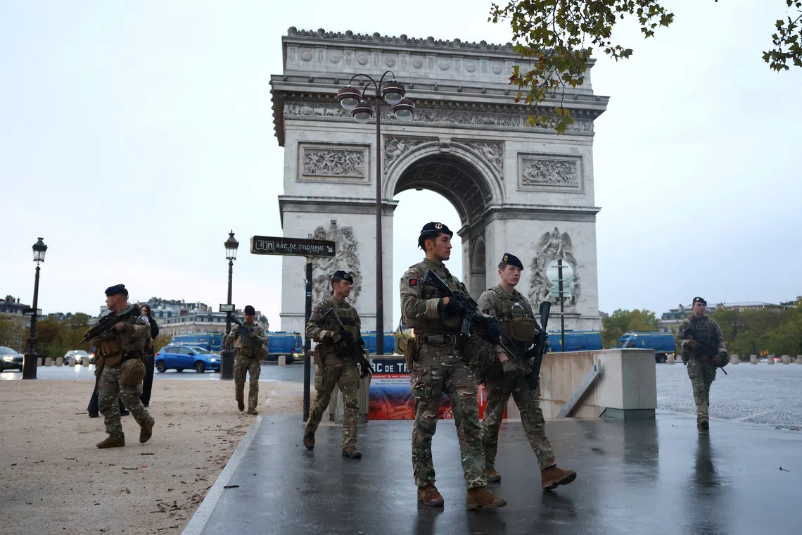 Much of central Paris took on the appearance of a city under lockdown, with shops, museums shut.