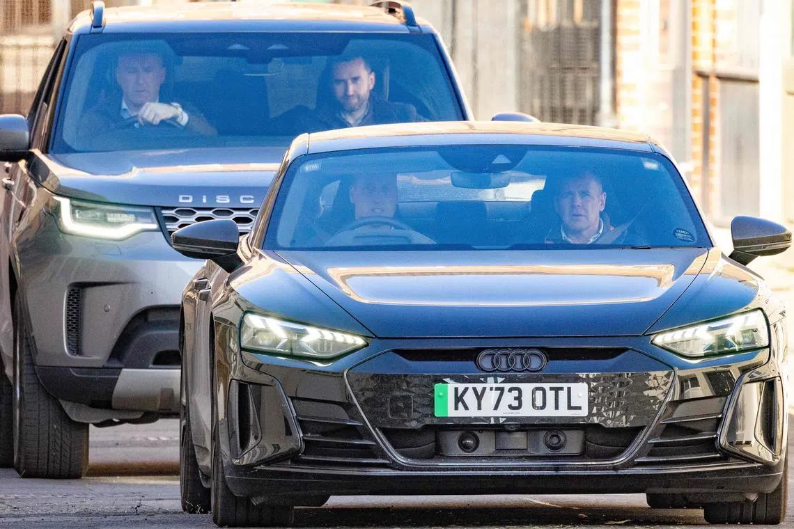 Prince William drives out of the London Clinic after visiting his wife, Kate, the Princess of Wales.