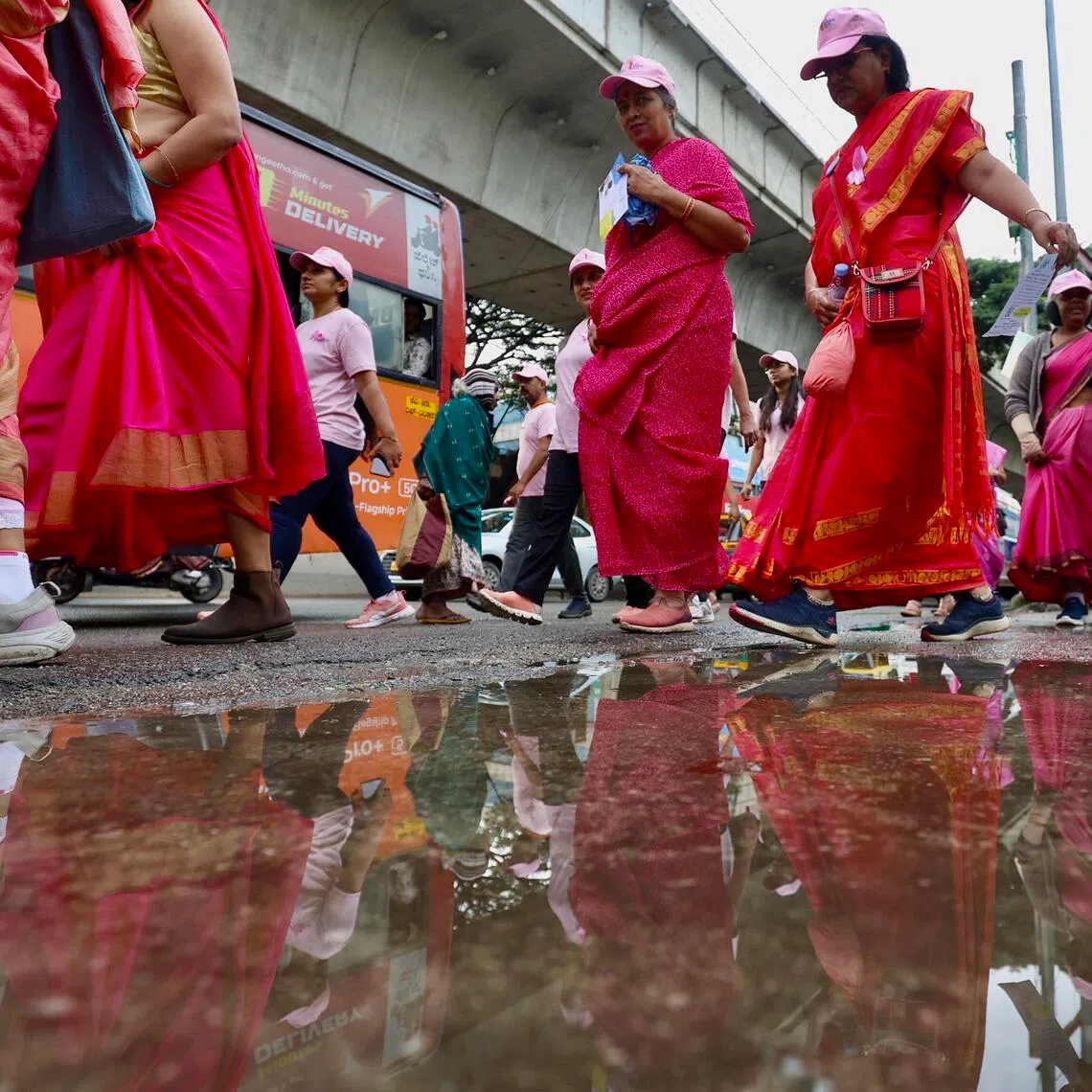 epa12446318 Indian women who wear sarees, doctors, nurses and breast cancer survivors participate in 'Saree Run' and some walk during a 'National Breast Cancer' themed 'Every Story is Unique, Every Journey Matters' awareness campaign in Bangalore, India 11 October 2025. United States as National Breast Cancer Awareness Month (NBCAM) was founded in 1985 to increase awareness of the disease prevention, diagnosis, treatment, cure and the fight against breast cancer. Breast cancer is the most commonly diagnosed cancer among women worldwide. In 2022, approximately 2.3 million women were diagnosed and another 670,000 died from the disease.  EPA/JAGADEESH NV