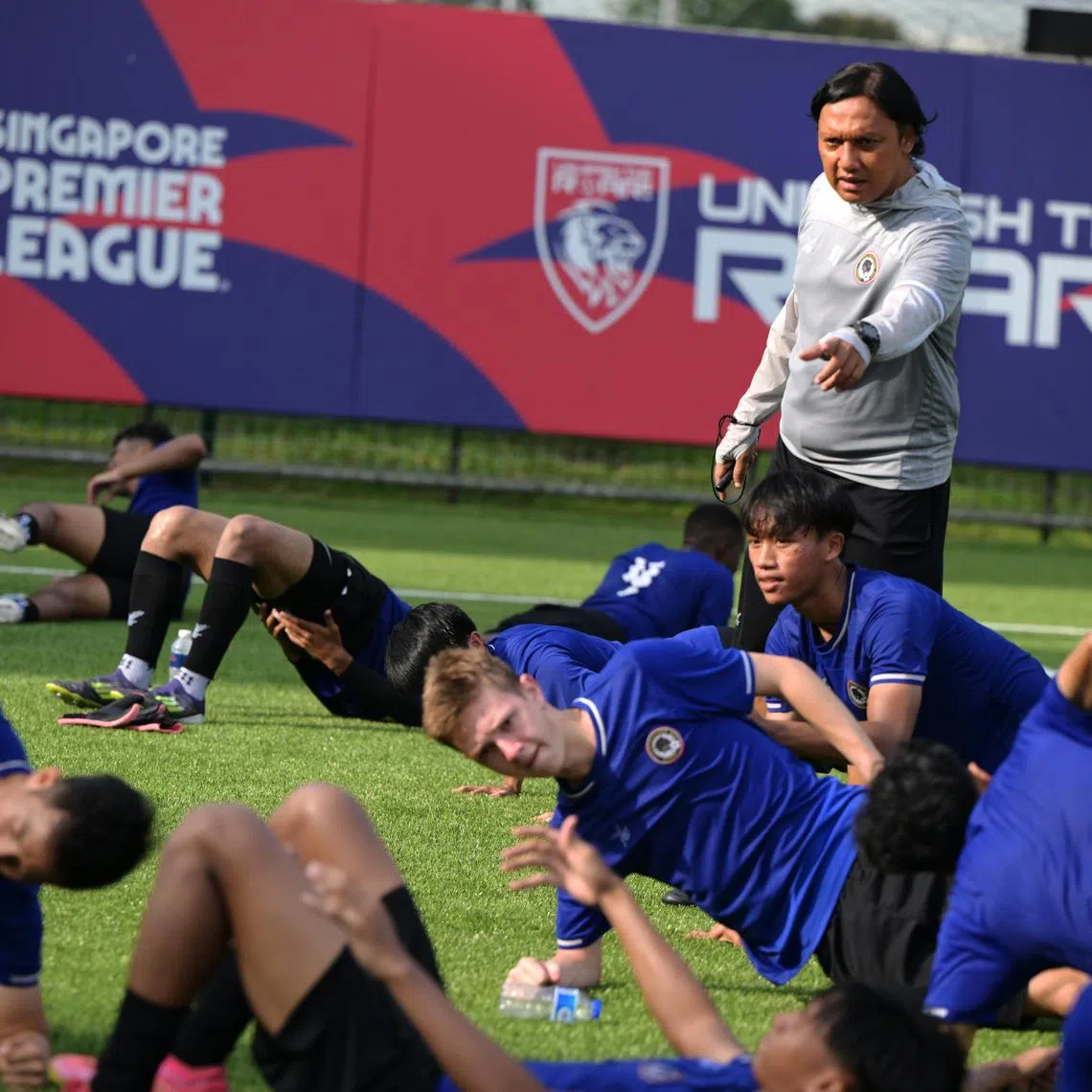 tbsoc13/ST20240911_202412800718/Ng Sor Luan/Tanjong Pagar United interim head coach Hyrizan Jufri overseeing the team's training session at Jurong East Stadium on Sept 11, 2024. 
