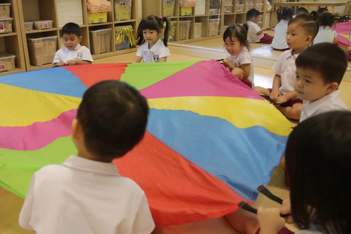 Children at Little Seeds Preschool (Church of the Good Shepherd) participating in a Chinese music and movement class.