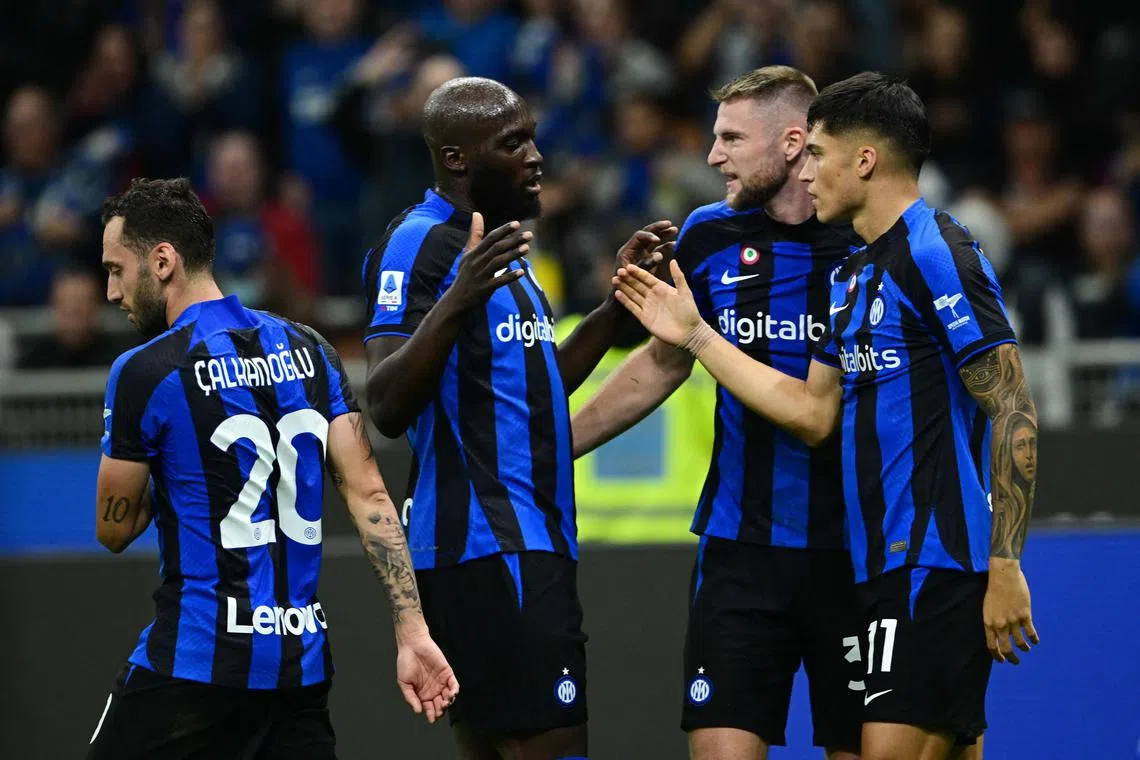 Inter Milan forward Joaquin Correa (right) being congratulated by teammate Romelu Lukaku after scoring his side's third goal in their win over Sampdoria at the San Siro. Worryingly for Belgium, striker Lukaku suffered a new hamstring injury in the 3-0 Serie A win on Saturday.