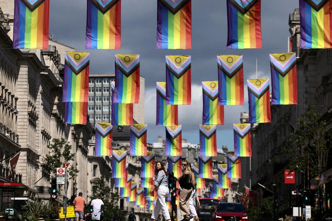 FILE PHOTO: Intersex-Inclusive Pride flags, designed by Valentino Vecchietti and used to represent the LGBTIQ+ community, hang across Regent Street ahead of Pride parade in London, Britain, June 26, 2022. REUTERS/Henry Nicholls/File Photo