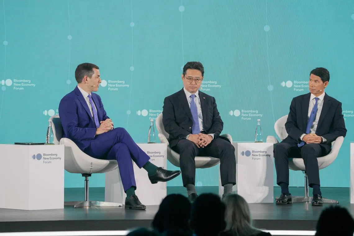 Mr Benjamin Deng (centre), chief investment officer of Ping An Group, and Mr Fred Hu, founder and chief executive officer of Primavera Capital, speaking at the Bloomberg New Economy Forum alongside moderator Tom Orlik from Bloomberg Economics.
