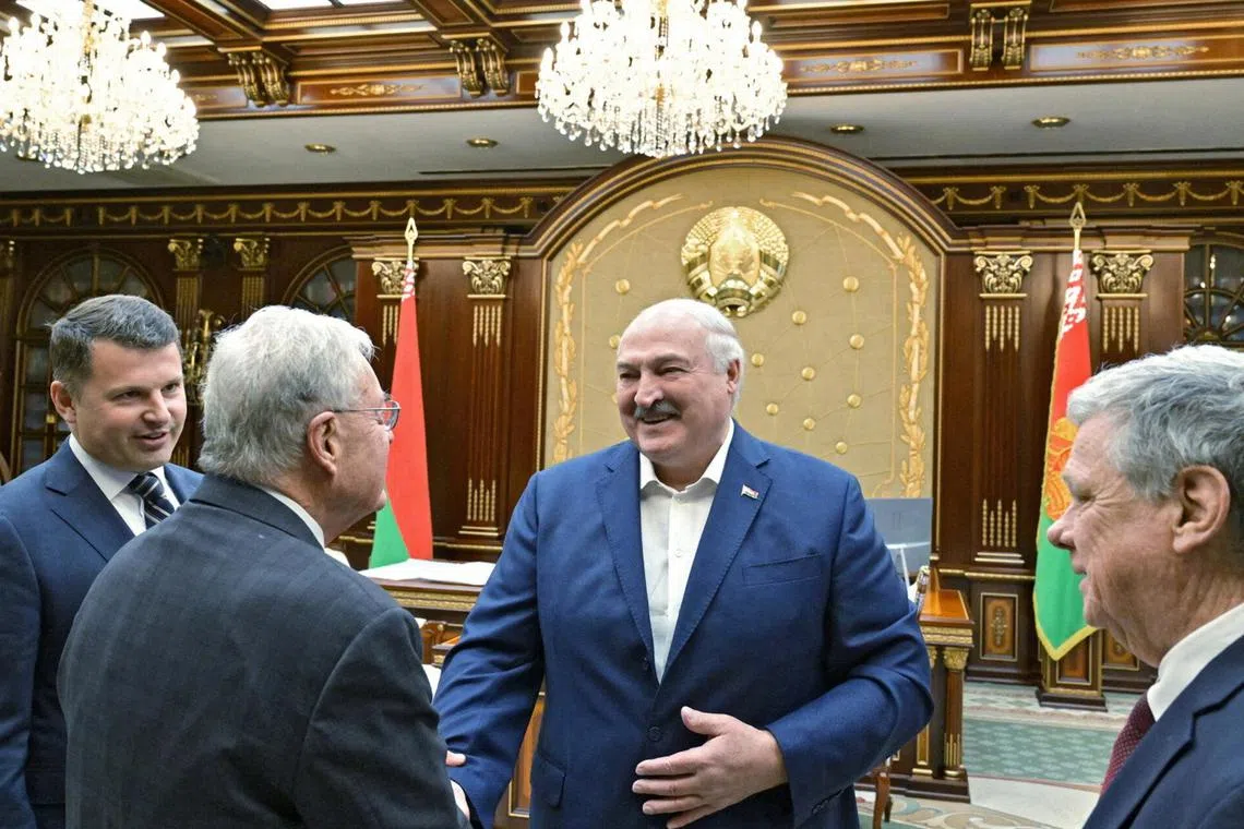 Belarusian President Alexander Lukashenko (centre) welcoming US special envoy Keith Kellogg to Minsk, on June 21.
