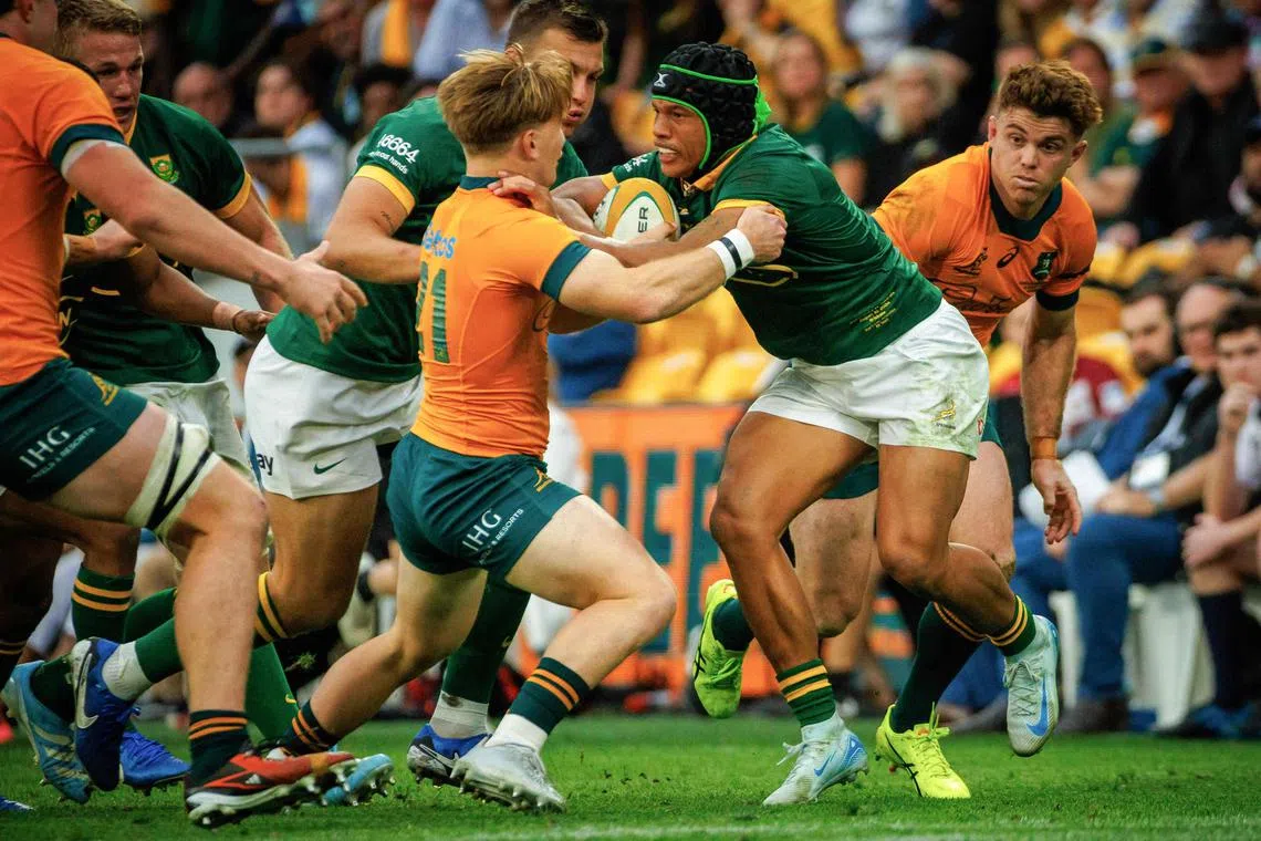 South Africa’s Cheslin Kolbe (right) is tackled by Australia's Tate McDermott in their Rugby Championship match at Suncorp Stadium in Brisbane on Aug 10, 2024.