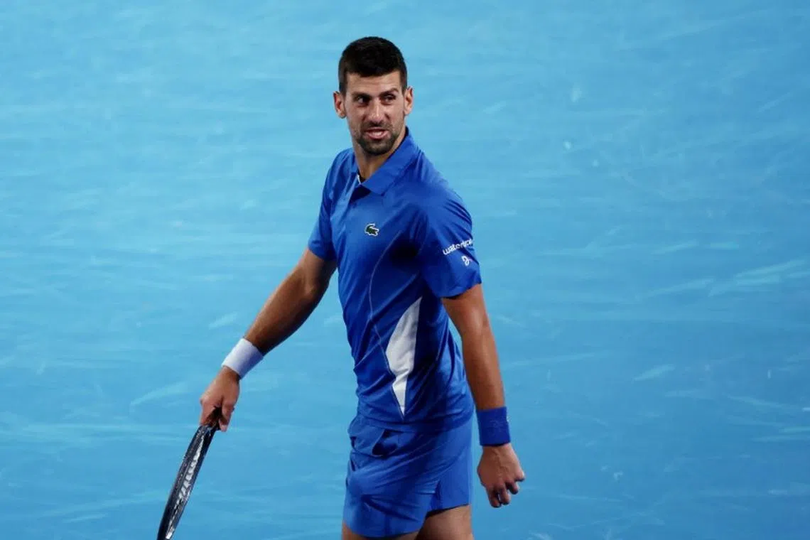 Tennis - Australian Open - Melbourne Park, Melbourne, Australia - January 17, 2024 Serbia's Novak Djokovic reacts towards the crowd during his second round match against Australia's Alexei Popyrin REUTERS/Eloisa Lopez
